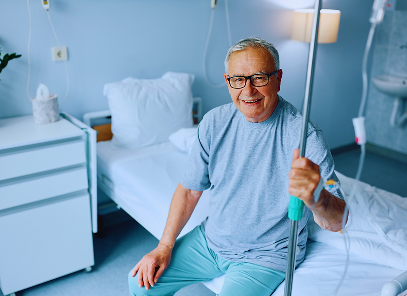 Elderly man receiving IV therapy for energy and wellness