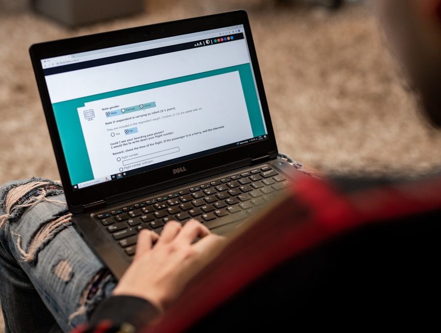 A friendly person filling out a career application form on a laptop